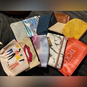 10 Ipsy bags (bag only).